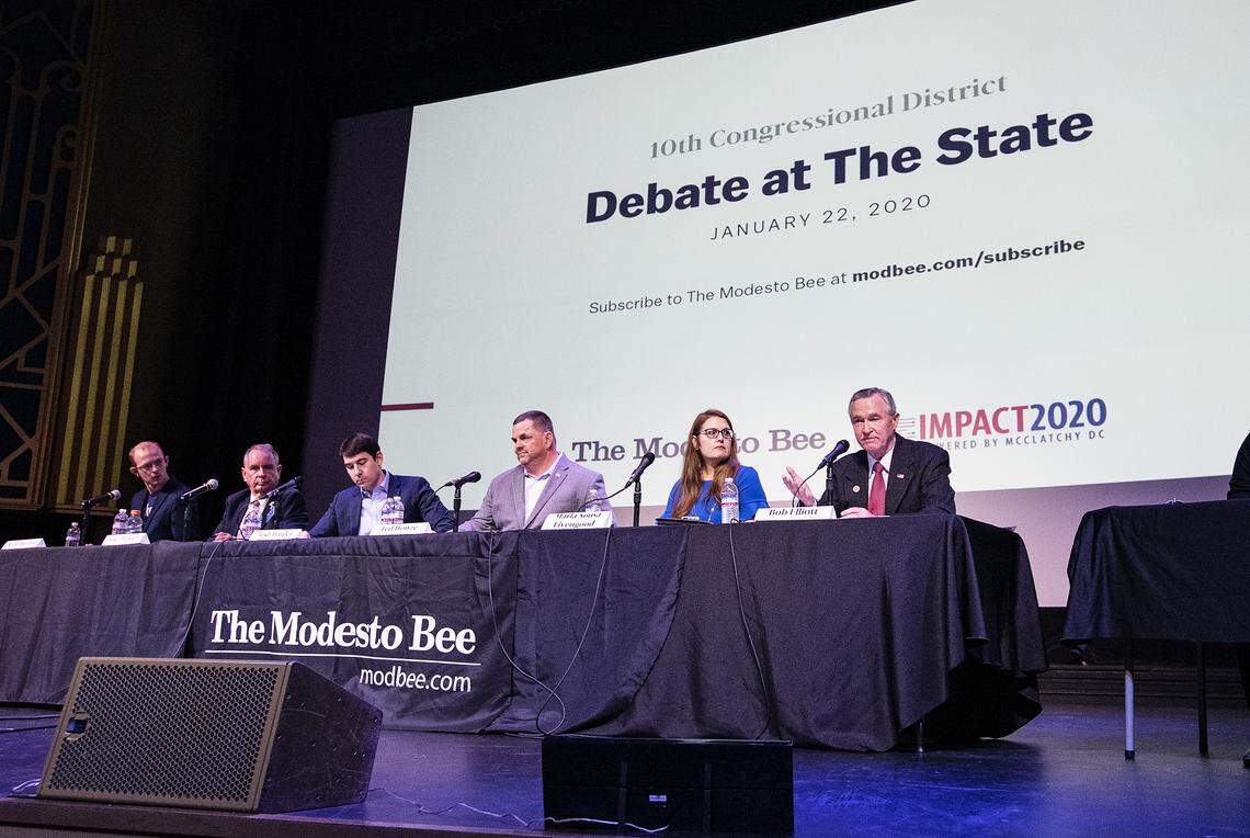 From the right, Bob Elliott, Marla Sousa Livengood, Ted Howze, Josh Harder, Mike Barkley and Ryan Blevins participate in the 10th Congressional District debate at the State Theatre in Modesto, Calif., on Wednesday, Jan. 22, 2020. 
