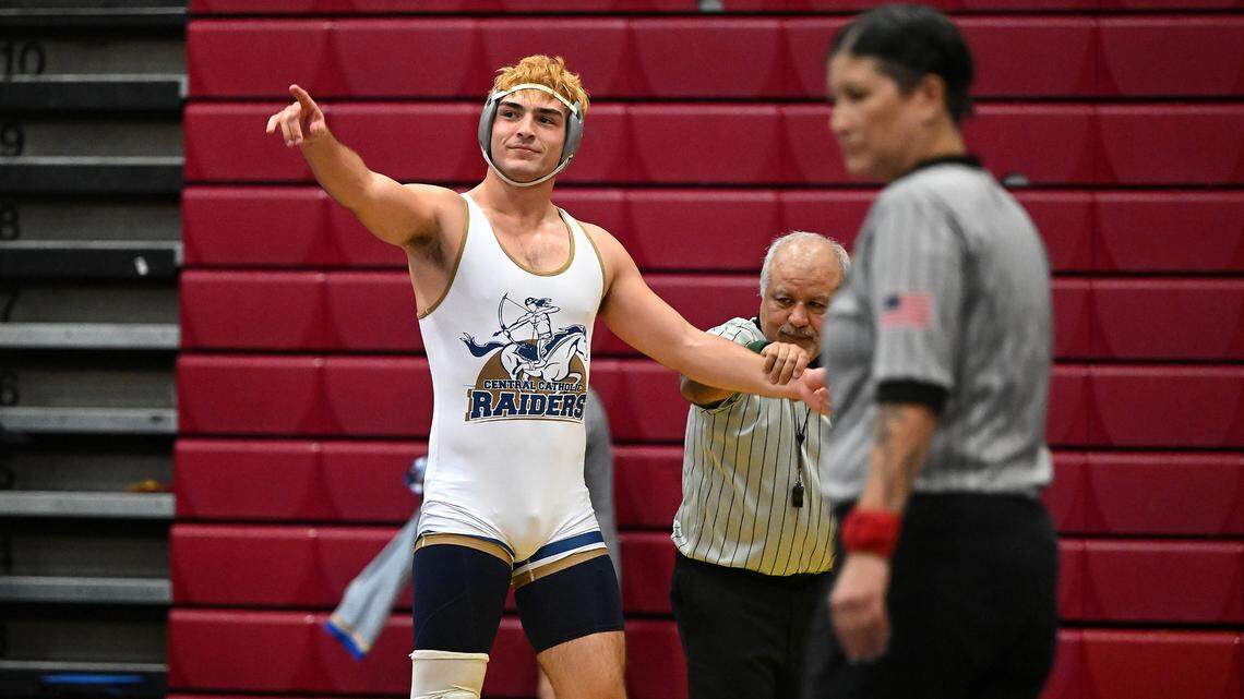 Central Catholic’s Hunter Goudeau signals to the crowd after winning the 190-pound match against Wood High in the Sac-Joaquin Section Team Duals Wrestling Tournament at Lincoln High School in Stockton, Calif., on Saturday, Jan. 27, 2024.