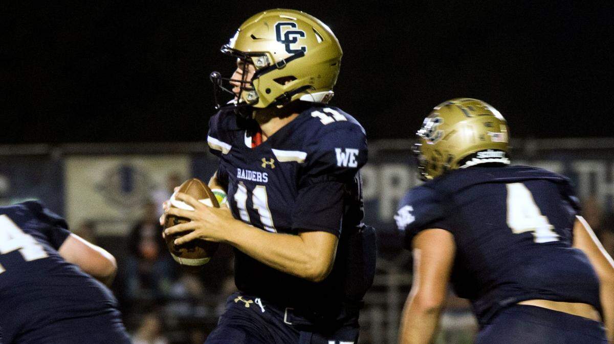 Central Catholic’s Tyler Wentworth looks downfield during his team’s game against Merced on Friday, Aug. 20, 2021.