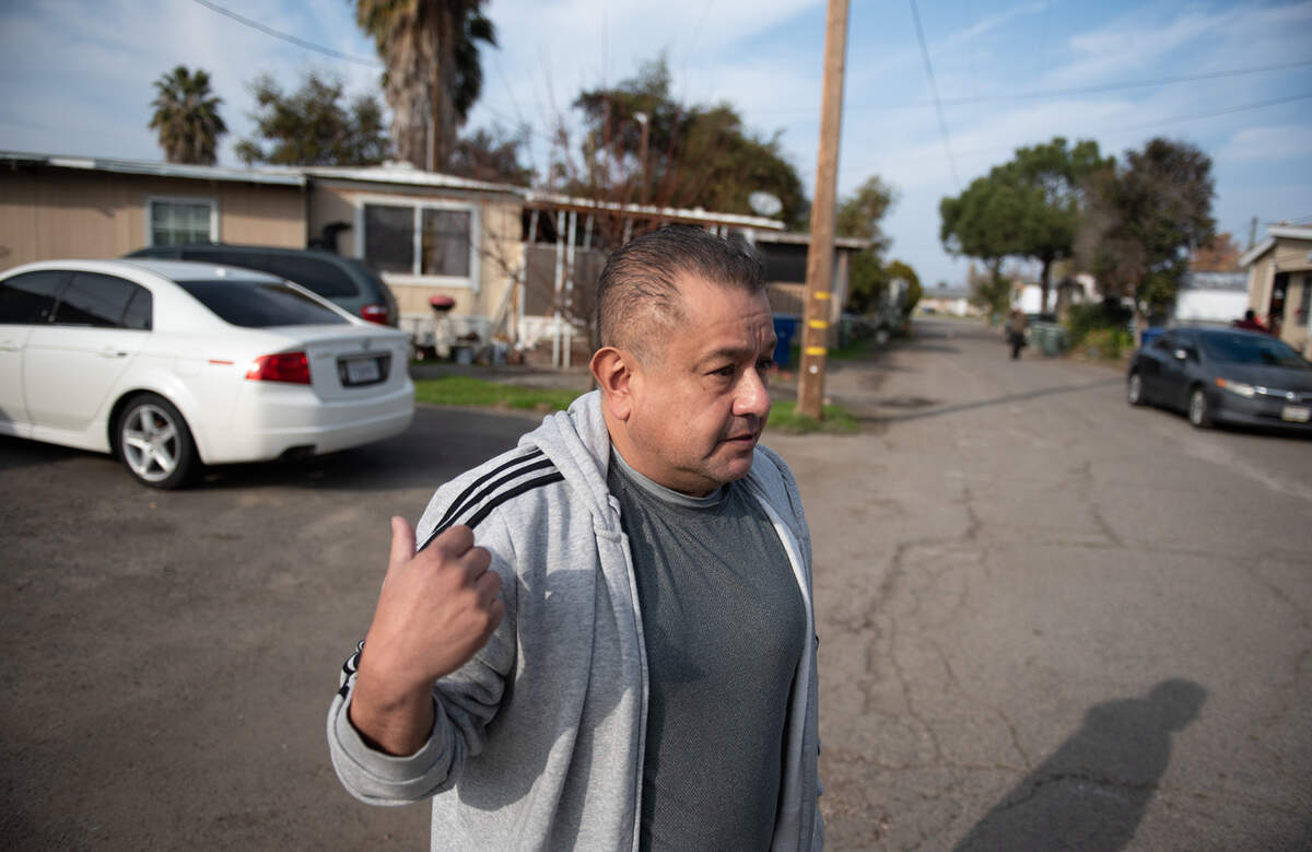Resident Gustavo Lopez talks about the living conditions at Lazy Wheels mobile home park in Ceres, Calif., Friday, Dec. 23, 2022.