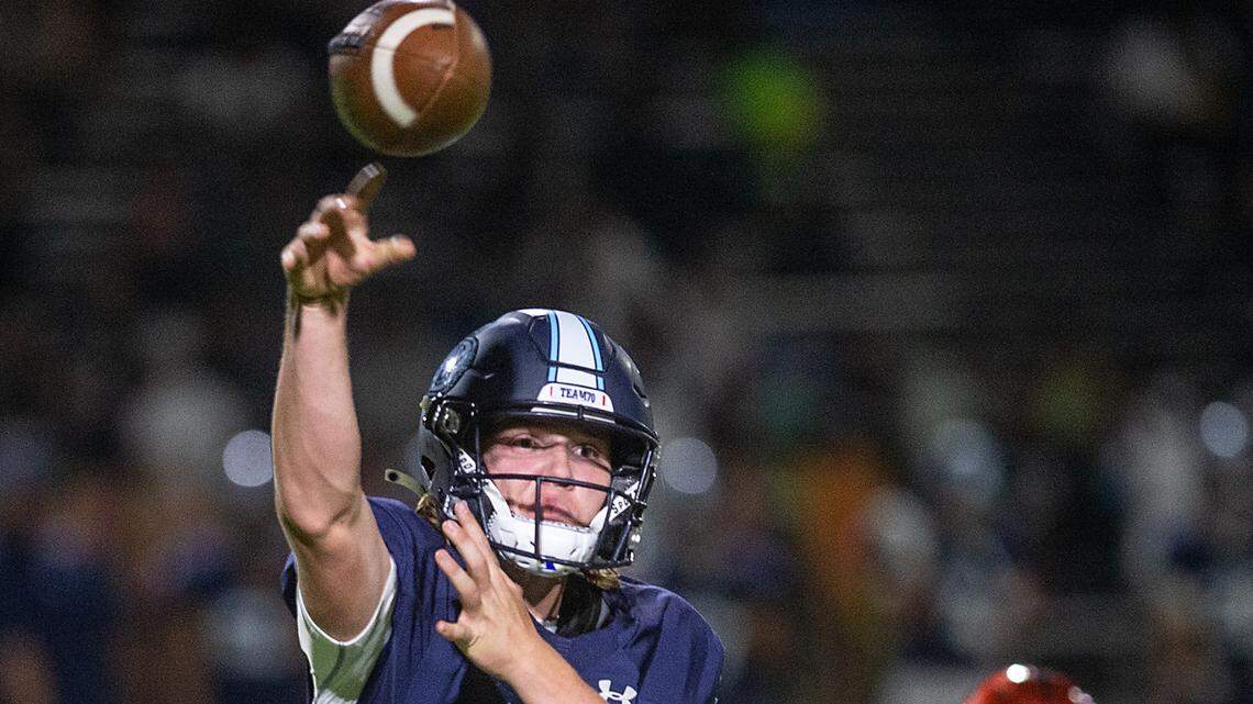 Downey quarterback Connor Stoddard throws a screen pass during a non-league game with Merced at Downey High School in Modesto, Calif., on Friday, Sept. 3, 2021.