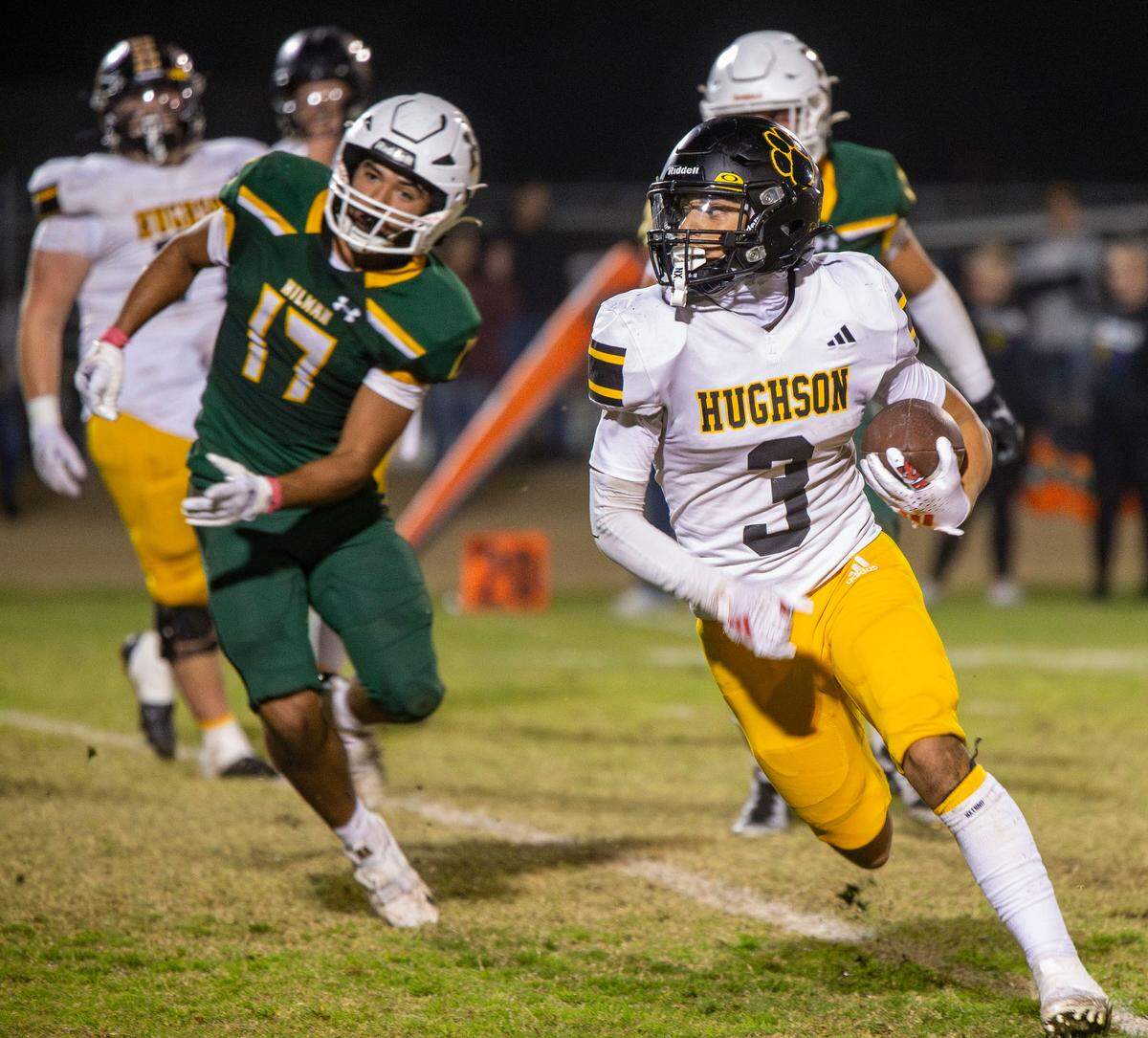 Lawson Aviles, 3, of Hughson High looks upfield for an opening during the Trans-Valley League game against Hilmar in Hilmar, Calif. on Friday Oct. 25, 2024.