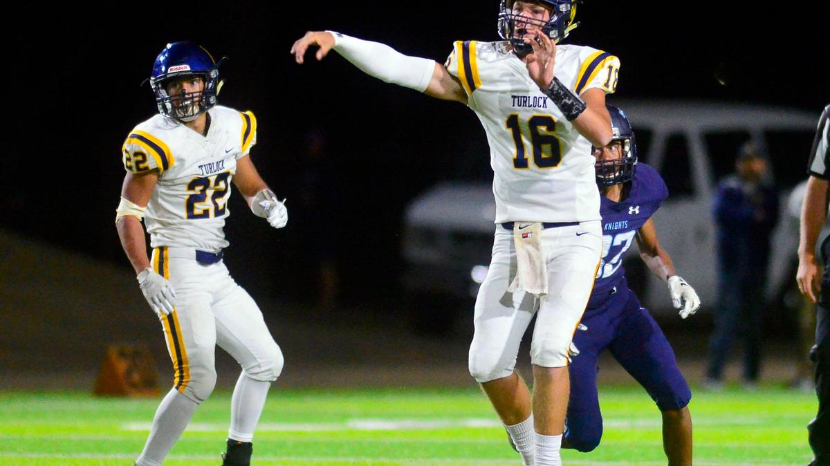 Turlock quarterback Brock Paslay (16) throws a pass over the middle during a game between Downey High School and Turlock High School at Downey High School in Modesto, CA on October 4, 2019.