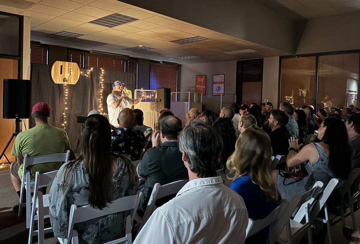 A sold out crowd attends Offline Comedy show at Mocse Credit Union on Saturday, July 26 in downtown Modesto. Comedian Brett Olson introduces the show.