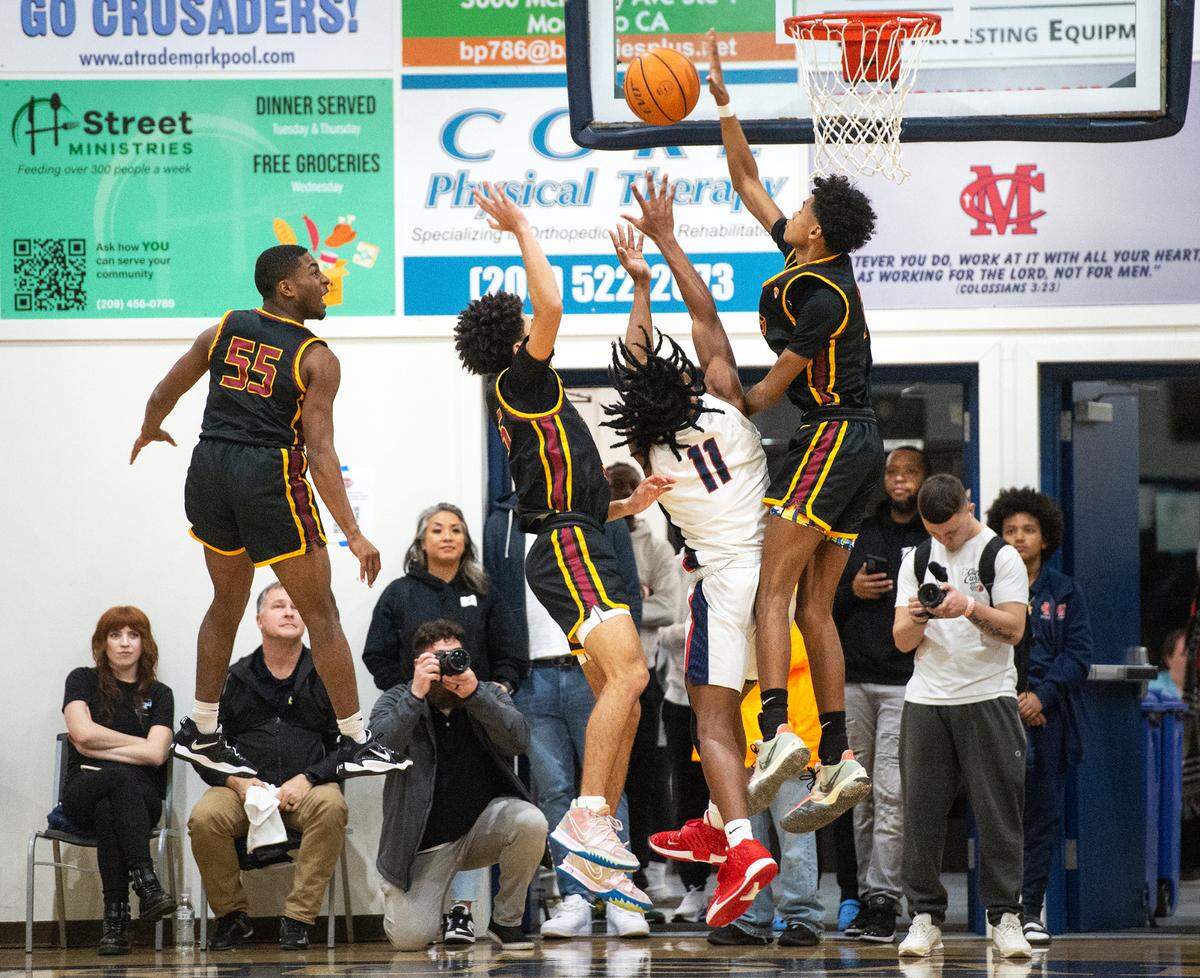 Modesto Christian and Clovis West battle in the championship game at the Modesto Christian Holiday Hoop Classic in Salida, Calif., Friday, Dec. 30, 2022.