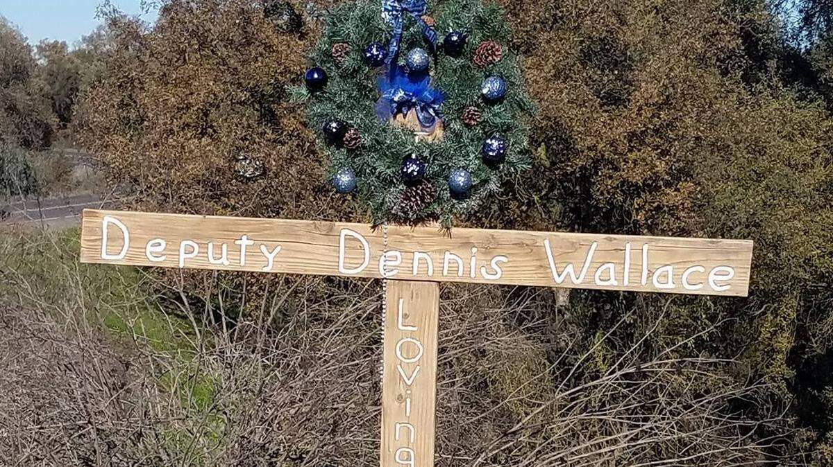This cross along Geer Road at Fox Grove Park, memorializing Deputy Dennis Wallace, was snapped off recently.