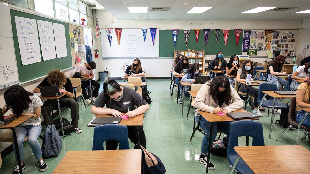 Students are required to wear masks indoors on campus at Davis High School n Modesto, Calif., on Monday, Aug. 9, 2021. Modesto City Schools saw more openings than usual this year, caused by a spike in early retirements combined with new positions added through pandemic relief funding.