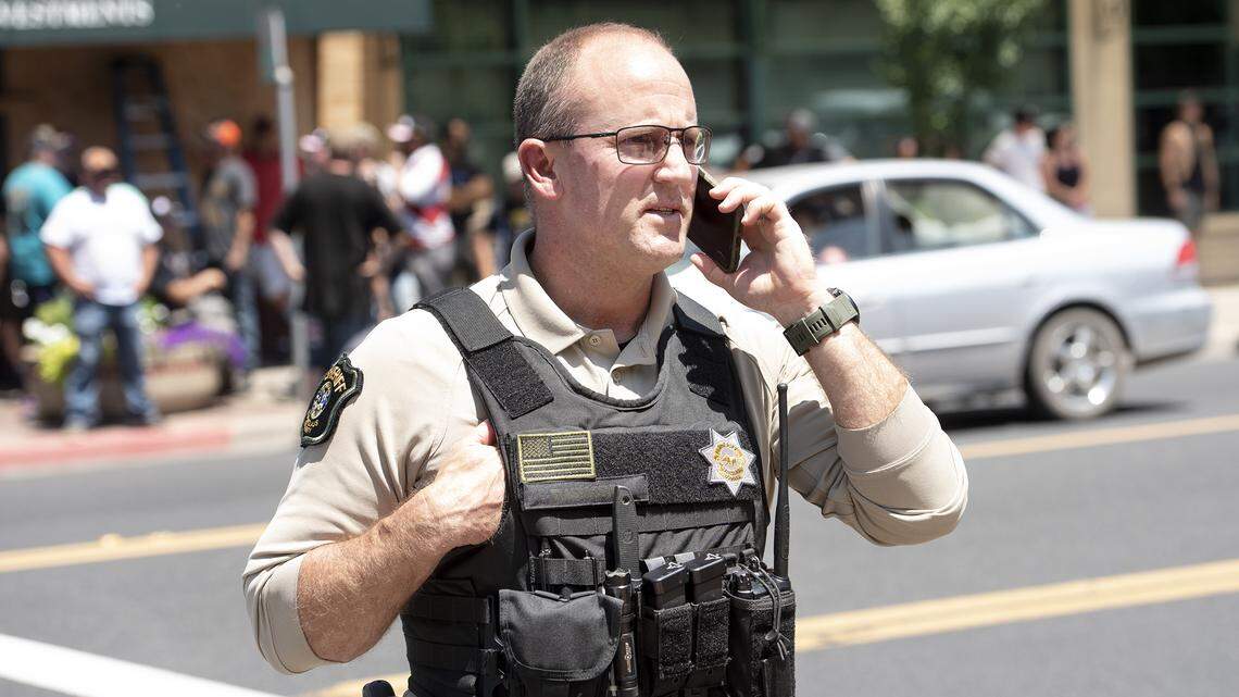 Stanislaus County Sheriff Jeff Dirkse keeps an eye on a demonstration in support of George Floyd in Oakdale, Calif., on Wednesday, June 3, 2020.