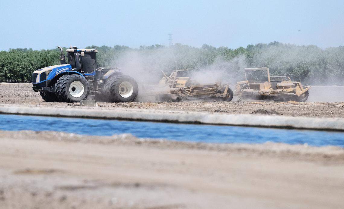 A farmer prepares the soil in Salida, Calif., Wednesday, Aug. 9, 2023. Valley fever is caused by a fungus found in soil in parts of California.