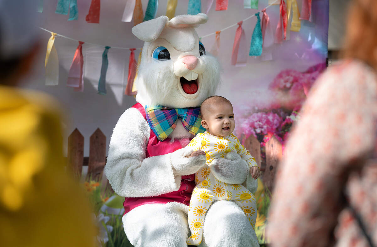 6-month-old Frederick Duncan celebrates his first Easter with the Easer bunny after the egg hunt at the farmer’s market in Modesto, Calif., Saturday, April 8, 2023.