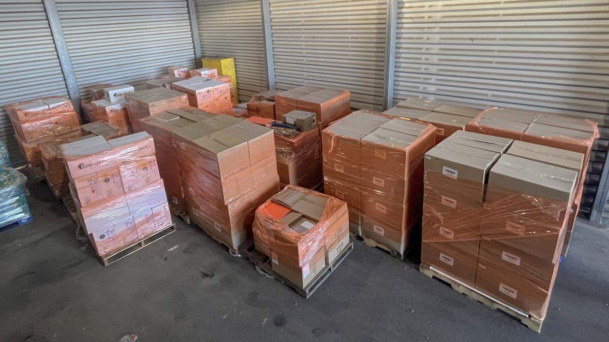 Boxes of stolen electronics recovered by the Stanislaus County sheriff’s detectives are stacked inside a storage area in Modesto.