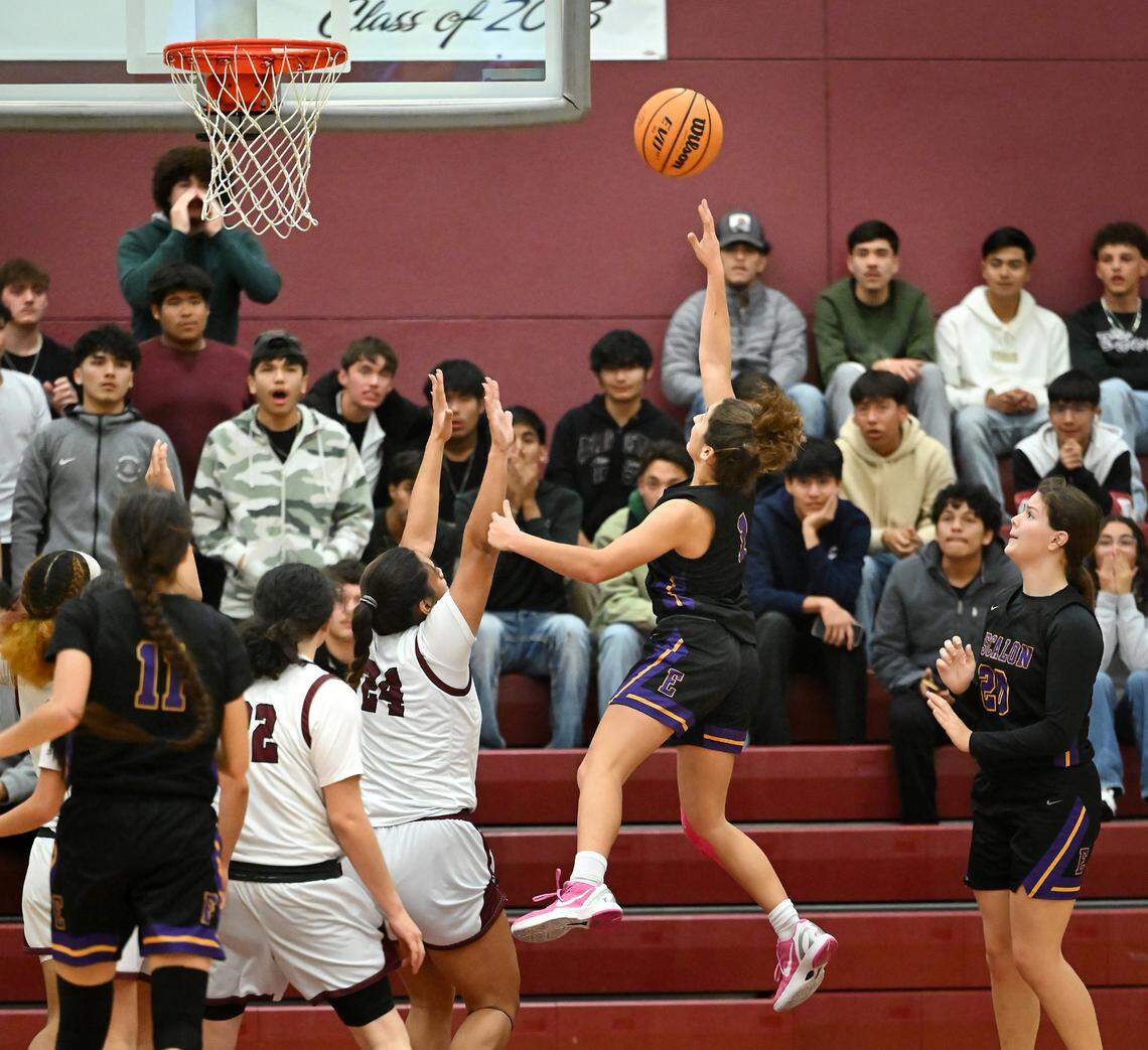 Escalon’s Sammy Lang scores the game winning basket in the Trans Valley League game with Riverbank at Riverbank High School in Riverbank, Calif., Thursday, Jan. 4, 2024. Escalon won the game 52-51.