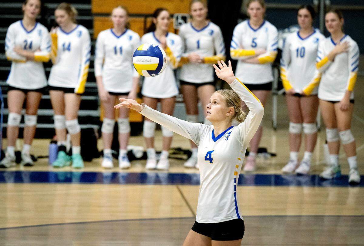 Ripon Christian’s Alyssa Hofman serves the ball during the CIF State Division 4 playoff game with West Valley of Cottonwood at Ripon Christian High School in Ripon, Tuesday, Nov. 12, 2024.