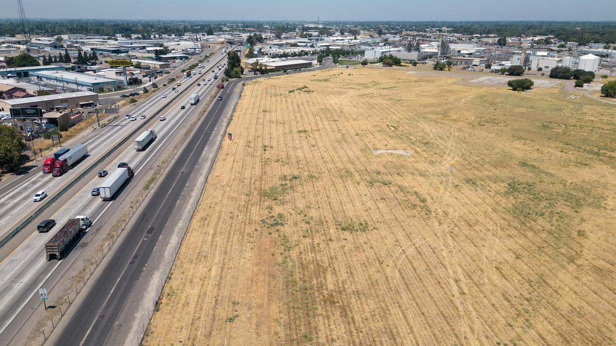 Property of the former FMC Corp. plant along Highway 99 on Graphics Drive in Modesto, Calif., Wednesday, July, 19, 2023. The plant, which left toxic soil after closing in 1984, has since been cleaned up.