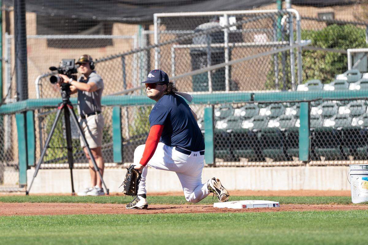 Ceres native Josh Pernetti prepares to pick the ball at first base during the Modesto Roadsters’ open tryout on Saturday, March 14, 2026. Pernetti was one of over 40 hopefuls looking for a spot on one of the Pioneer Baseball League’s newest expansion teams.