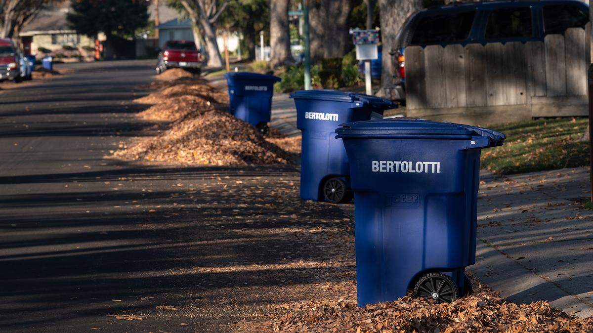 Refuse cans for recyclables were delivered to residents in Modesto, Calif., Friday, Dec. 16, 2022.