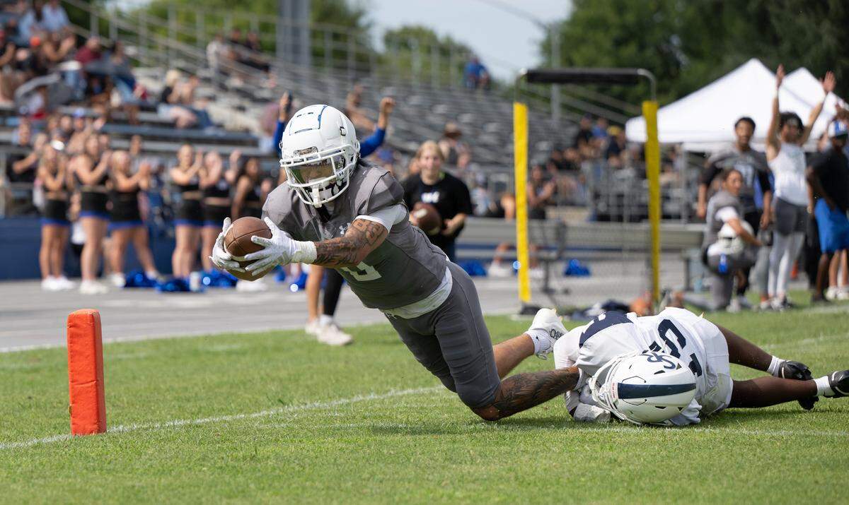 Modesto’s Bronson England scores a touchdown after a catch during the game with Santa Rosa Junior College at Modesto Junior College in Modesto, Calif., Saturday, September 9, 2023. Modesto won the game 51-41.