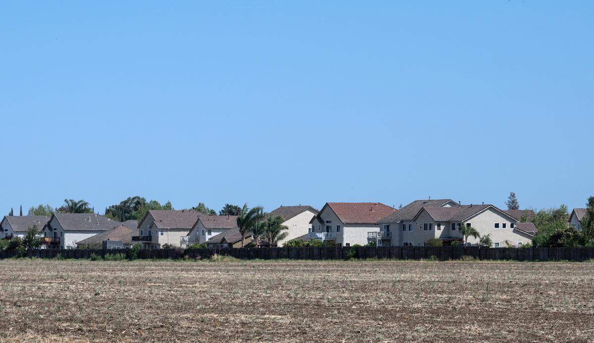 Site of the proposed Zacharias housing development seen from Baldwin Road in Patterson, Calif., on Tuesday, April 12, 2022.