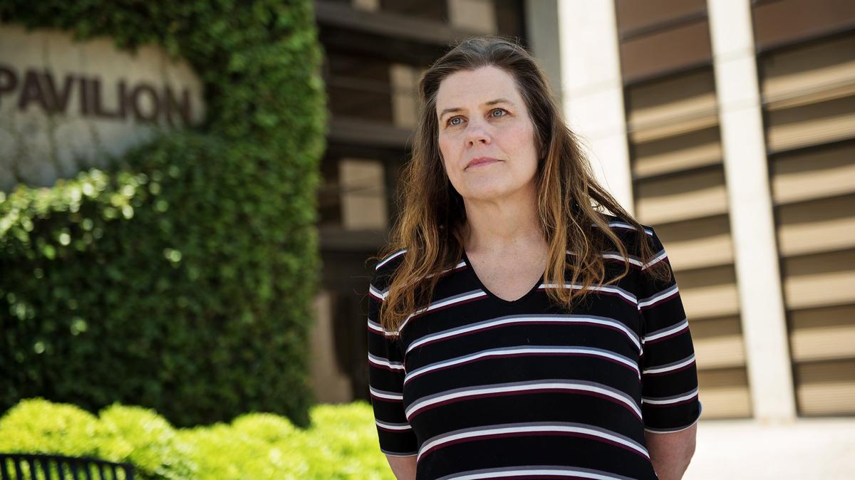Jennifer Roach outside CrossPoint Community Church in Modesto, Calif., Thursday, May 31, 2018. Roach was sexually abused by a youth pastor many years ago as a teenager at the church which was formerly First Baptist.
