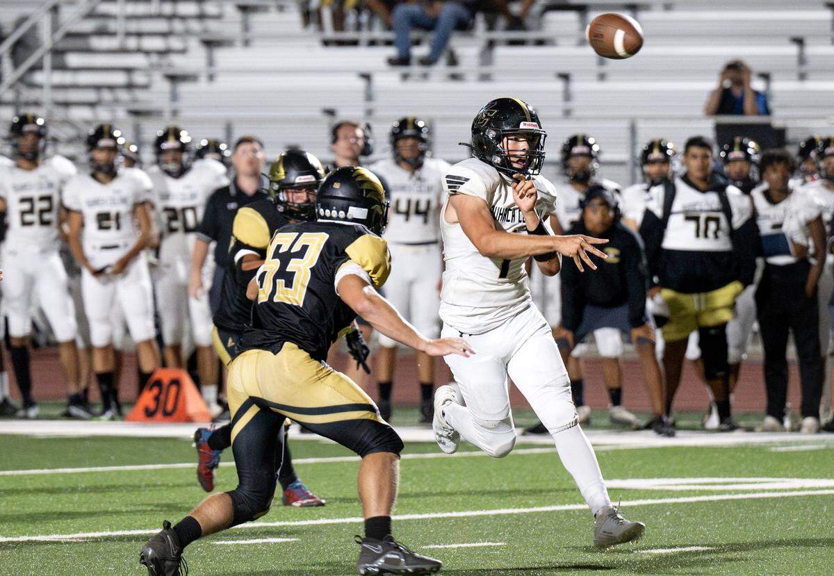 Buhach Colony quarterback Patrick Curran throws the ball on the run during the non-league game with Enochs at Gregori High School in Salida, Calif., Friday, Sept. 1, 2023.