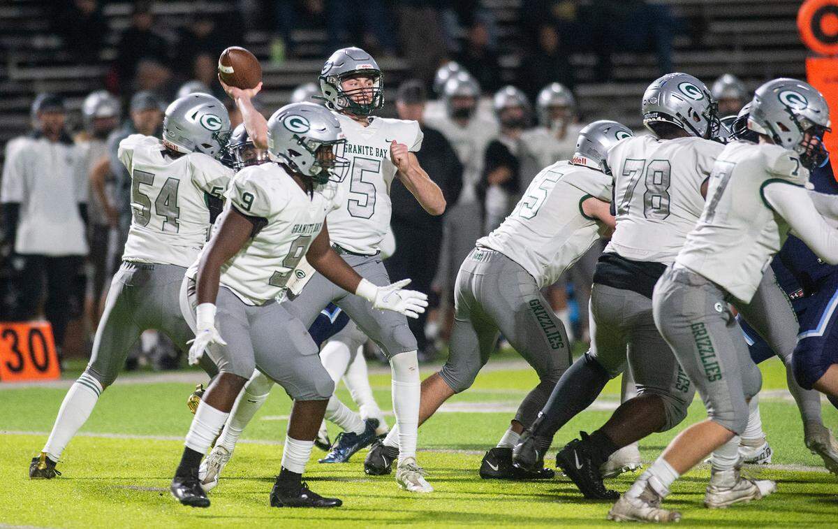 Granite Bay quarterback McCade Long makes a pass during the CIF Sac-Joaquin Section Division II playoff game with Downey at Downey High School in Modesto, Calif., Friday, Nov.11, 2022.