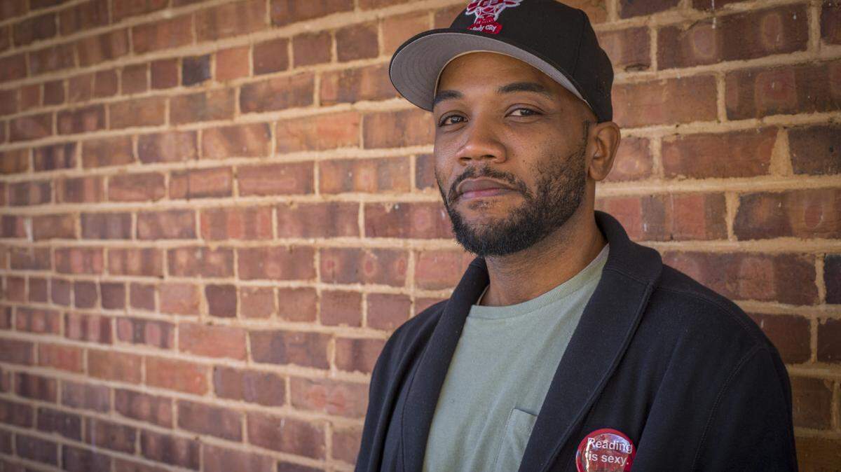 A.D. Carson stands on the porch of the Trustee House at Clemson University on Jan. 26, 2017. Carson, now a professor of hip-hop at the University of Virginia, will be at CSU Stanislaus in Turlock on Feb. 25 to present his program “This is the Next Time: Reflections on Resistance Through Rhymes and Revolutions.”
