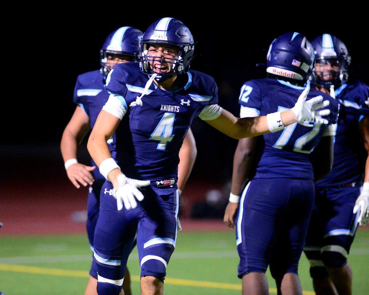 Downey receiver Joseph Ramirez (4) celebrates after scoring a touchdown in the 4th quarter during a game between Downey High School and Elk Grove High School at Downey High School in Modesto, Calif. on August 30, 2024.
