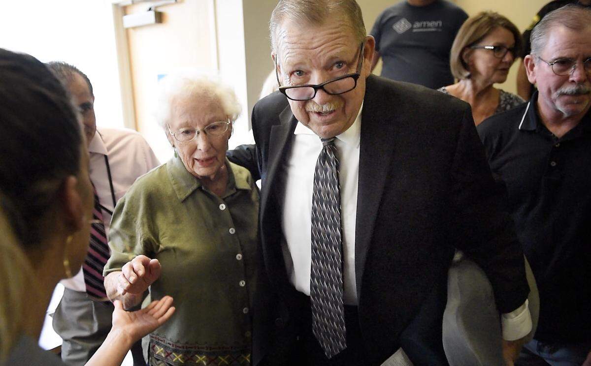 Frank Carson leaves the Stanislaus County Superior Courthouse with his mother Vallie Carson, left, after a jury found him not guilty of murder in Modesto, Calif., Friday, June 30, 2019. Carson spent the past four years accused of murder in the death of Korey Kauffman.