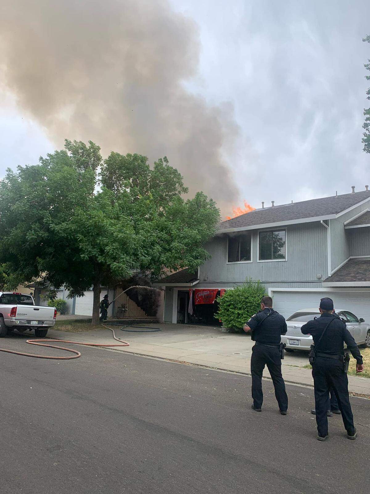 Firefighters from the Modesto Fire Department respond to an engulfed duplex on the 1900 block of Glen Ridge Drive in Ceres, CA on Tuesday, June 18, 2024.