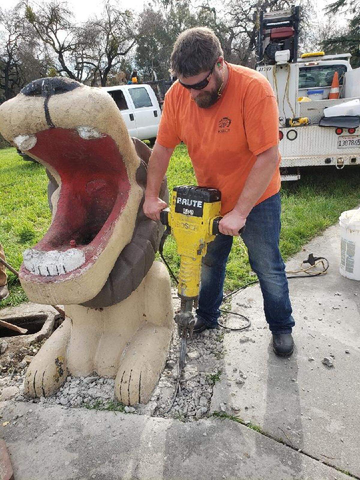 The Leo the lion water fountain is removed from Beard Brook Park in February 2022.