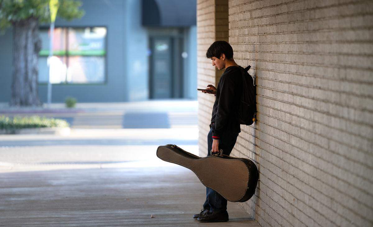 Edwin Santoyo takes a break in the music department at Modesto Junior College in Modesto, Wednesday, Nov. 6, 2024.