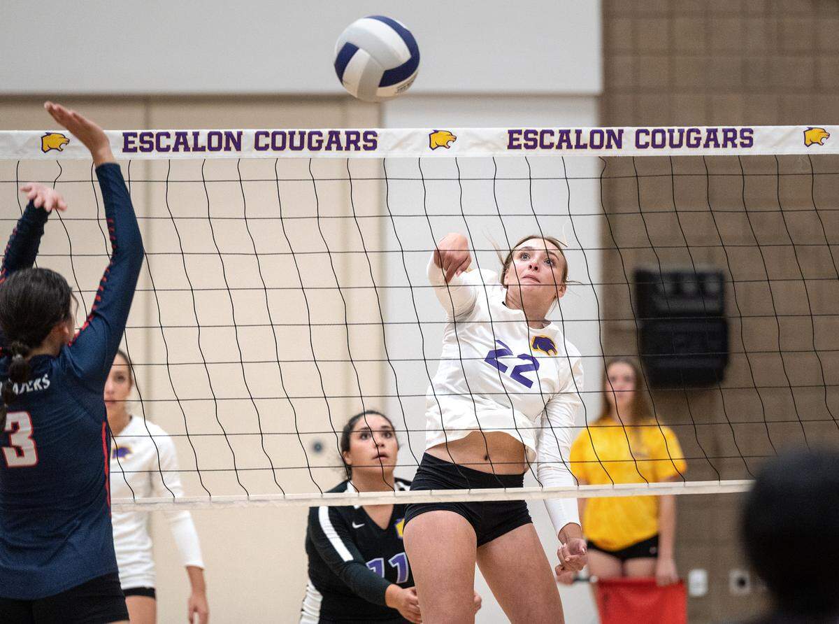 Escalon’s Mallory Berhorst spikes the ball during the non-league match with Modesto Christian in Escalon, Calif., on Wednesday, September 7, 2022. Escalon won 3-0.