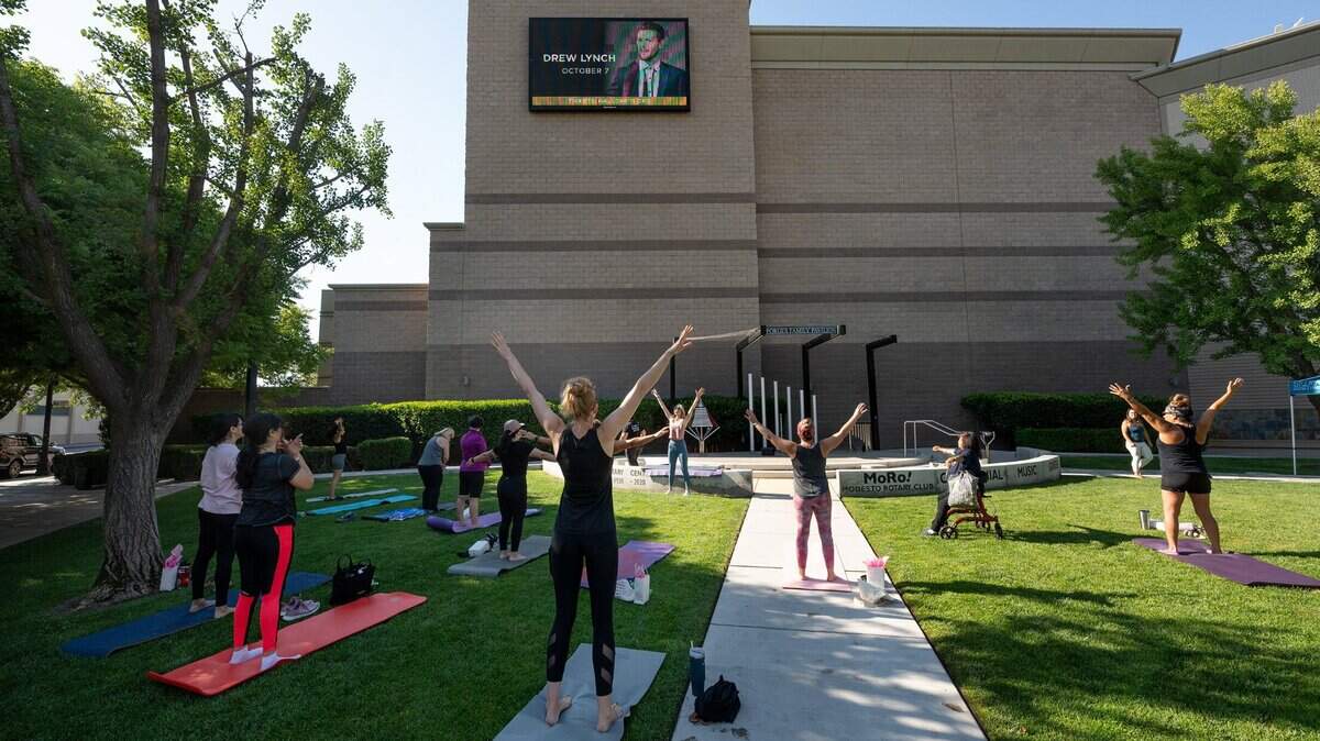 Studio V instructor Victoria Popoff leads a free Pilates class in 2023 outside the Gallo Center for the Arts in Modesto.