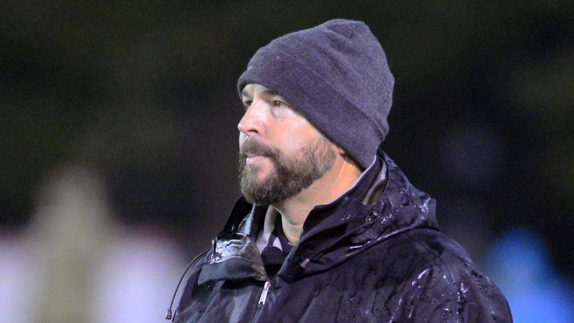 Ripon Christian head coach Trey Ozenbaugh watches his team from the sidelines during a Division VI CIF Sac-Joaquin playoff game between Ripon Christian and Modesto Christian at Modesto Christian High School in Modesto CA on November 23, 2018.