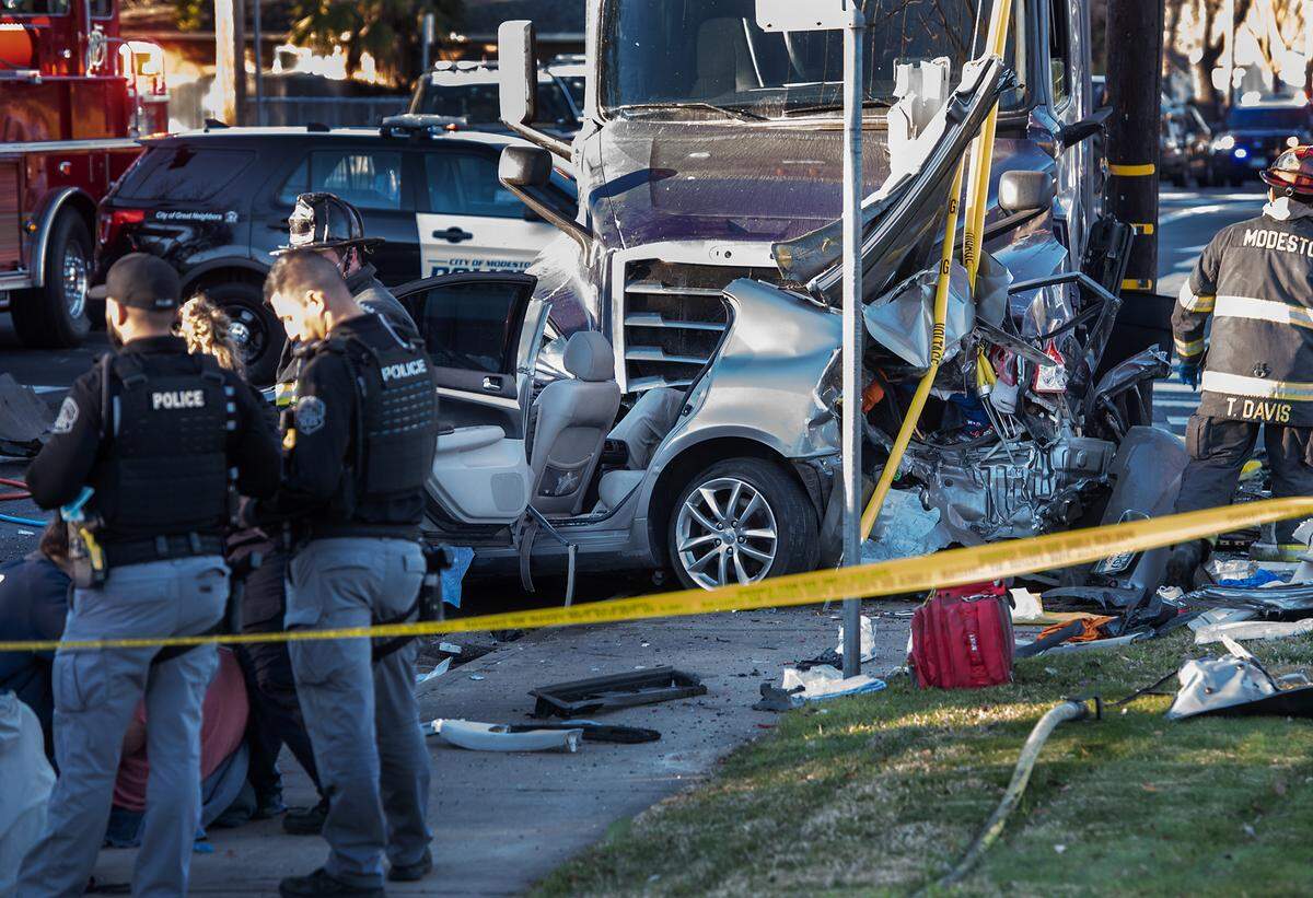 Modesto firefighters and police respond to a fatal accident Briggsmore Avenue and Carver Road in Modesto, Calif., on Tuesday, Feb. 1, 2022.