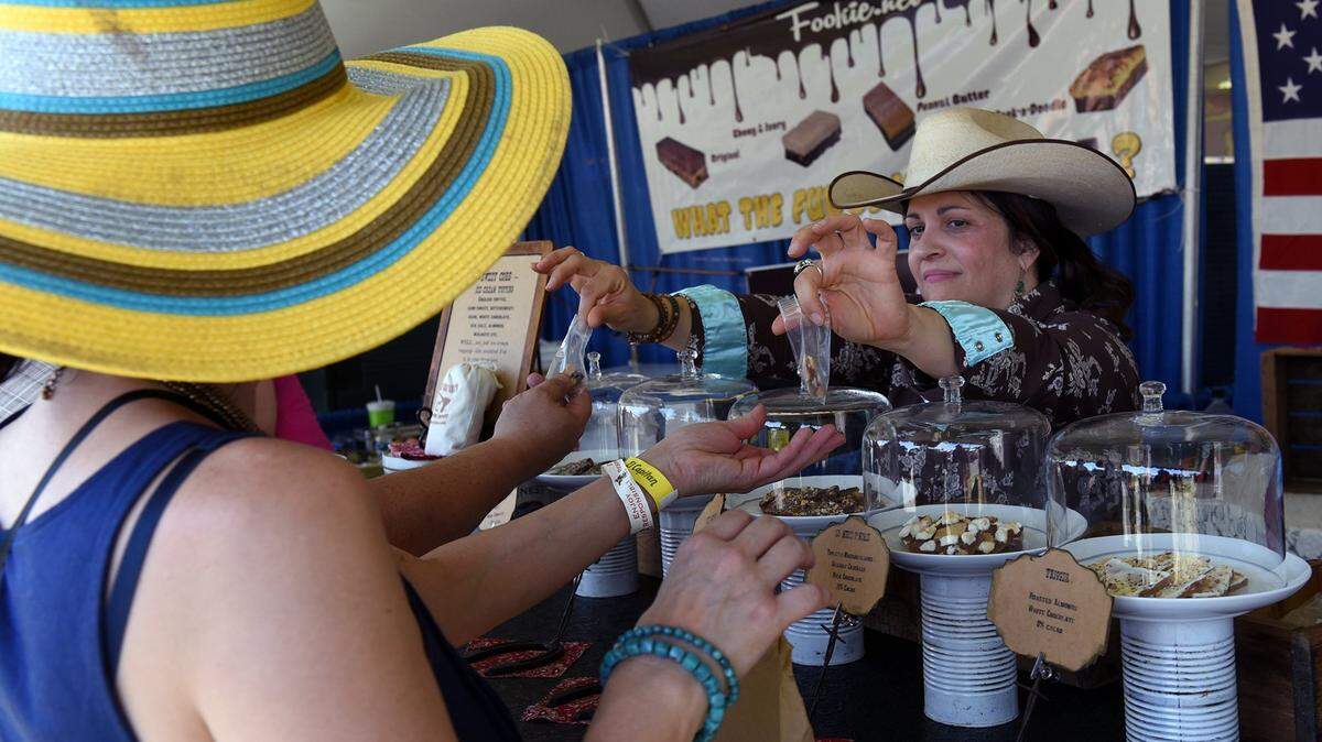 Samples are handed out at a past year’s Oakdale Chocolate Festival.