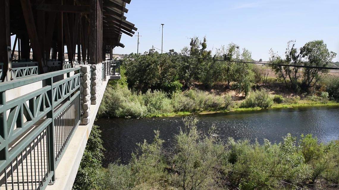 The Tuolumne River flows under the covered bridge in Roberts Ferry.