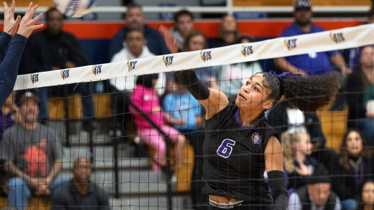 Bradshaw Christian’s Monica Buchanan spikes the ball during the Sac-Joaquin Section Division V championship match with Big Valley Christian at Cosumnes River College on Saturday.