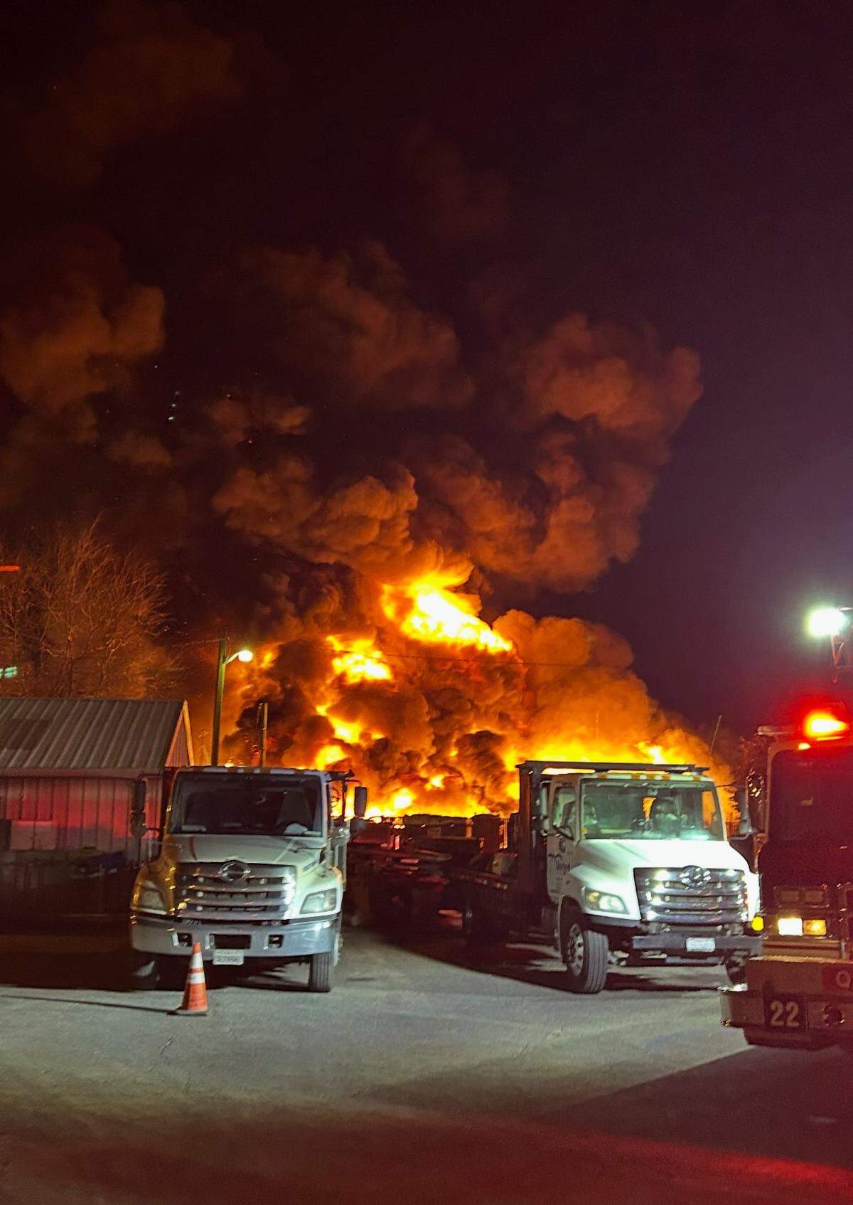 A fire in a large commercial yard on the 2000 block of Yosemite Boulevard early Wednesday, Feb. 19, 2025, burned construction trailers and other equipment and threatened a neighborhood. Modesto Fire crews quickly brought it under control.