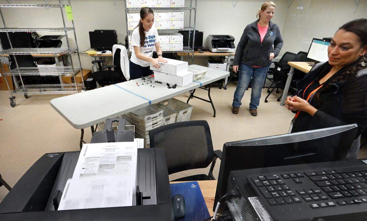 Ballots are scanned and votes are counted at the Stanislaus County Registrar of Voters Office in Modesto, Wednesday, Oct. 23, 2024.