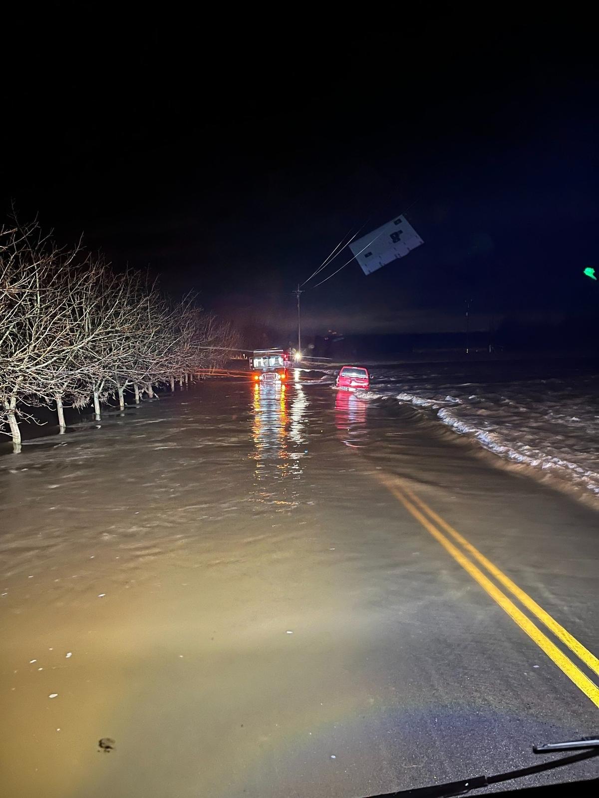 Firefighters rescued two motorists who became stranded in a flooding at Claribel and Tim Bell roads on Jan. 9, 2023.
