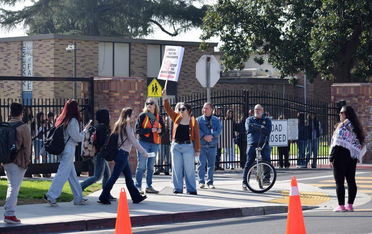Turlock High School Principal David Kline watches as students walk out on Friday, Jan. 30, 2026.