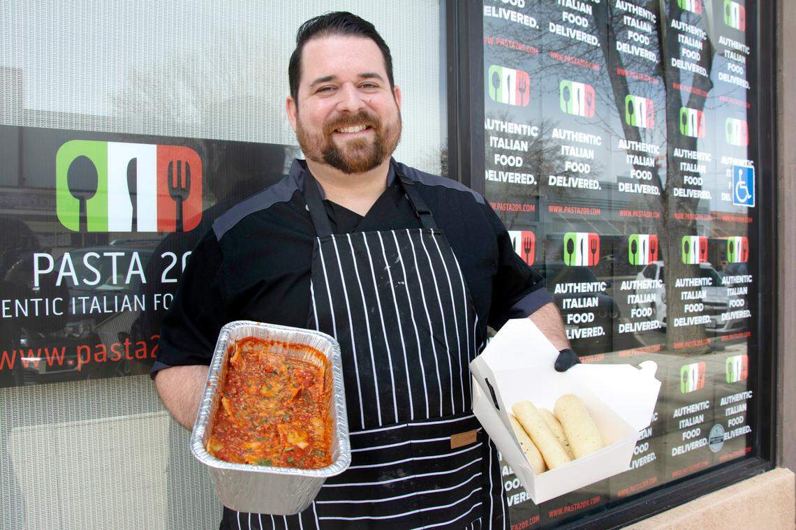 Chef/owner Jason Buktenica in front of the new storefront for his ghost kitchen restaurant Pasta 209 in Gustine, Calif. Feb. 18, 2021.