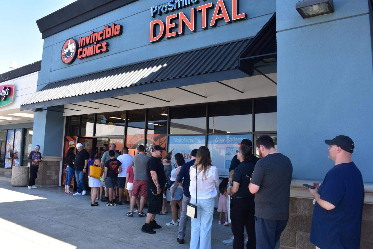 Fans line up to meet The Incredible Hulk star Lou Ferrigno at Invincible Comics in Modesto on Friday, June 7.