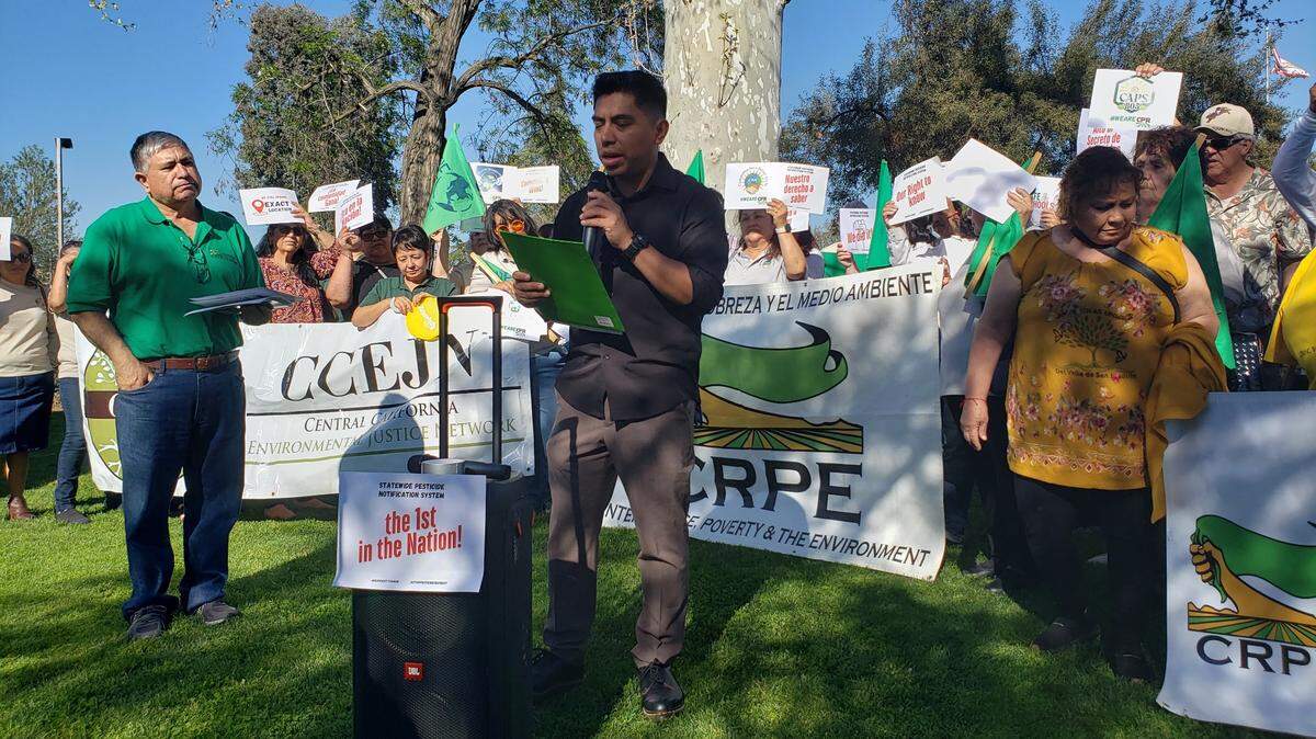 Angel Garcia of Californians for Pesticide Reform addresses the crowd in Shafter on March 24, 2025.