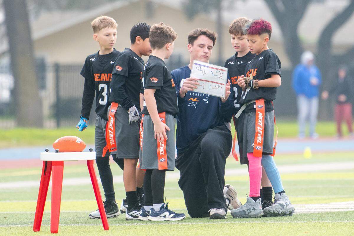Next Level Sports youth athletes are coached by high school students each Sunday in the flag football league. The all-girls spring league will incorporate girls coaches from local high schools.