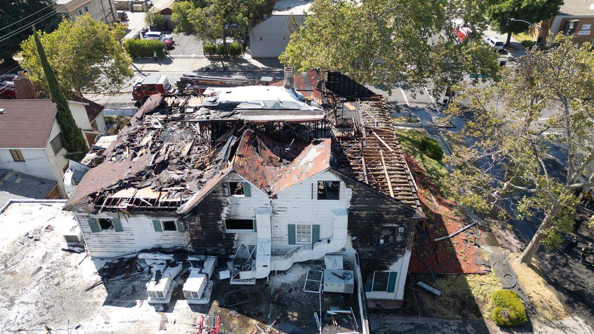 The former Franklin and Downs Funeral Homes building at 12th and G streets was damaged by an early morning fire in Modesto, Calif., Tuesday, July 16, 2024.