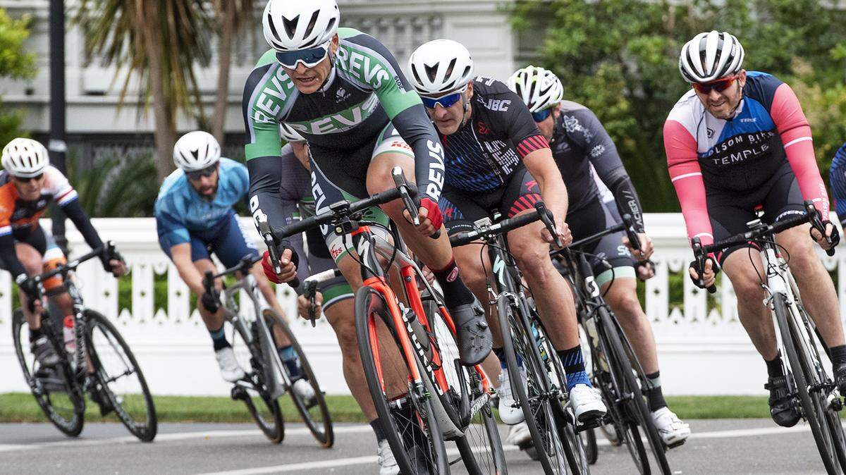 Mens Masters 35+ bike racers pass by the McHenry Mansion during the Modesto Road Race and Criterium in Modesto, Calif., Saturday, May 18, 2019.