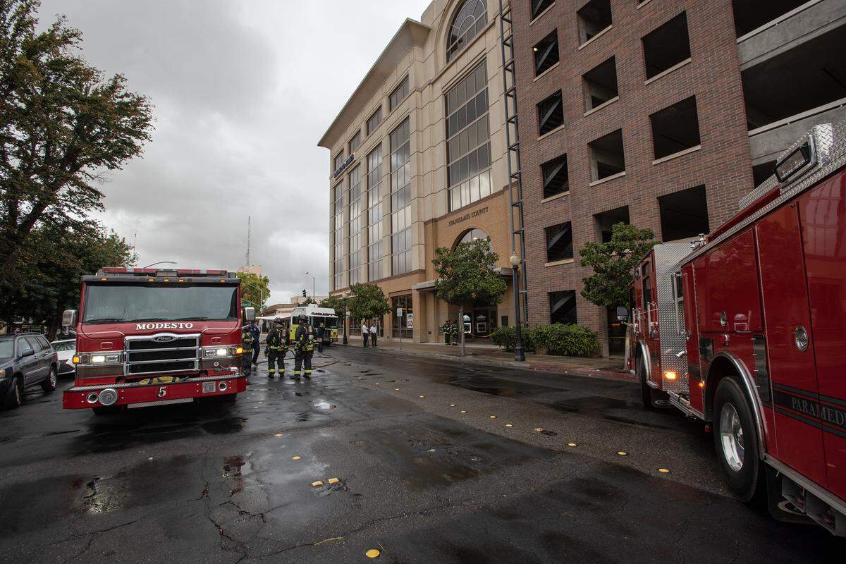 The Modesto Fire Department’s hazmat team responded to the Stanislaus County District Attorney’s Office, where a suspicious package was dropped off, in Modesto, Calif., Tuesday, Nov. 1, 2022.