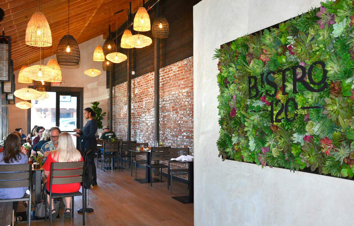 Diners sit in the expanded dining area of the new Bistro 120 restaurant in Oakdale, Calif. Sept. 5, 2023.